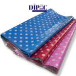 papel seda disponible de color celeste, rojo y rosa con lunares blancos.